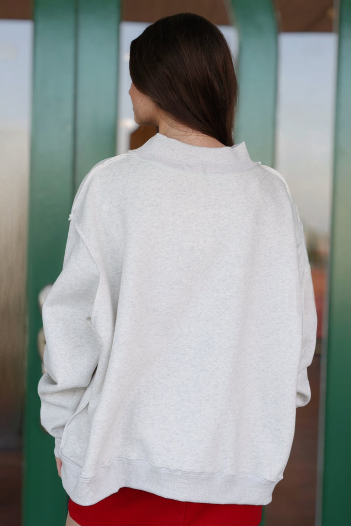 Merry Embroidered Mock Neck